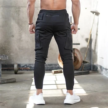 2021 Corredores de Mens Calças de Moletom Preto Homens calças de Fitness Esportes Trackpants Streetwear Calças Grande pockages musculação Calças