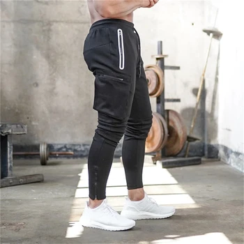 2021 Corredores de Mens Calças de Moletom Preto Homens calças de Fitness Esportes Trackpants Streetwear Calças Grande pockages musculação Calças
