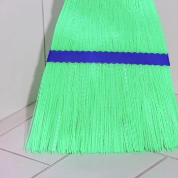 Broom plastic, metal cuttings 28 × 140 cm