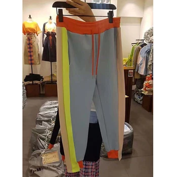 Coreia 2020 outono de novo a correspondência de cores irregulares cordão elástico na cintura casual calças das mulheres calças soltas tendência KZ772